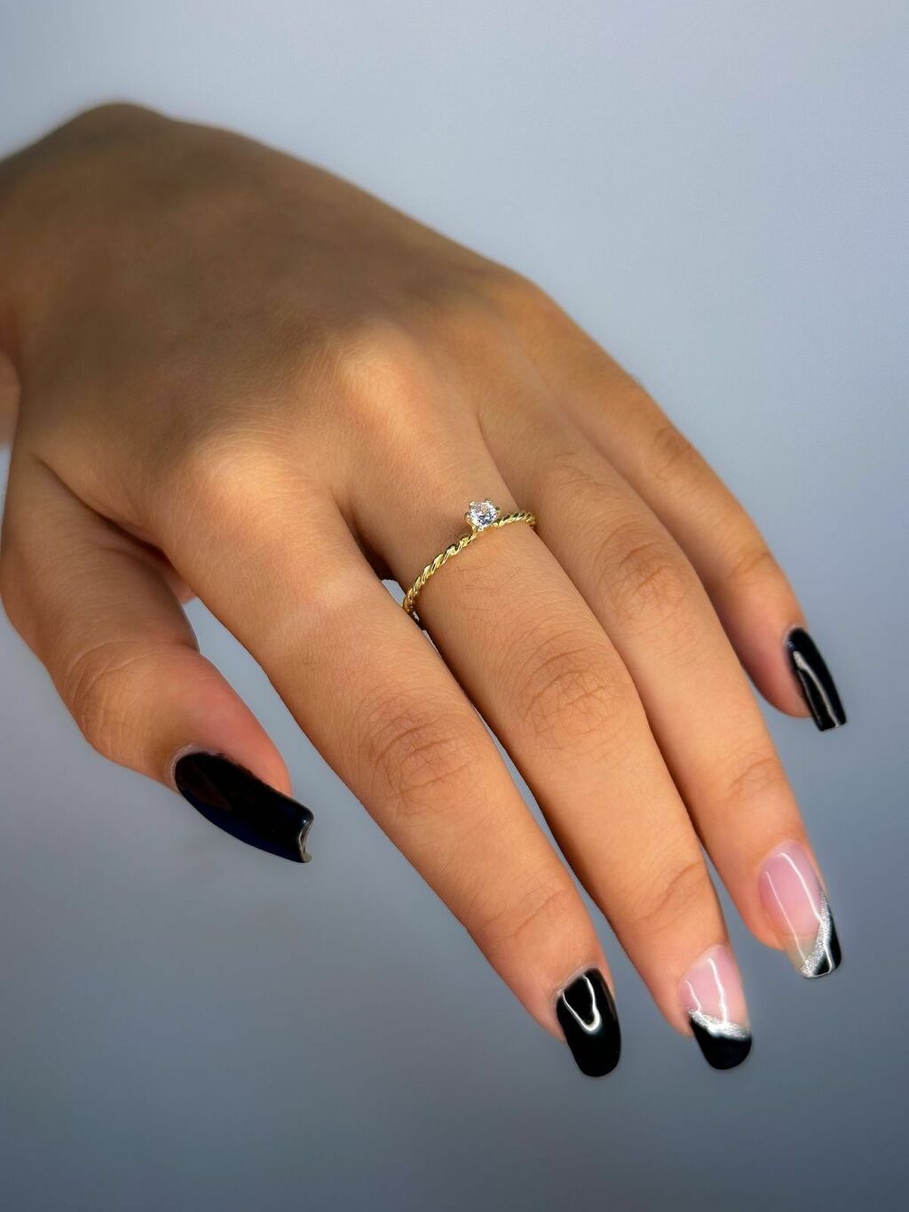 Anel solitário entrelaço ouro 18k