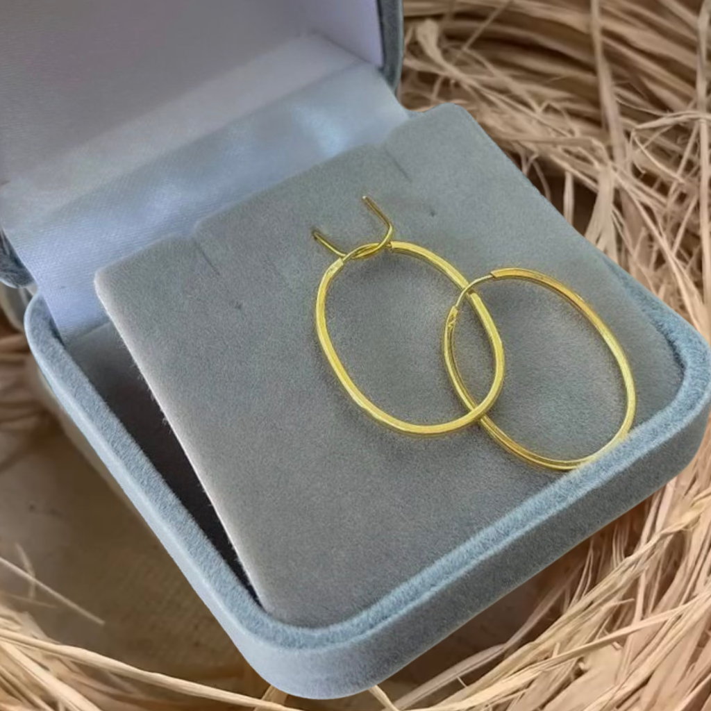 Brinco argola oval ouro 18k