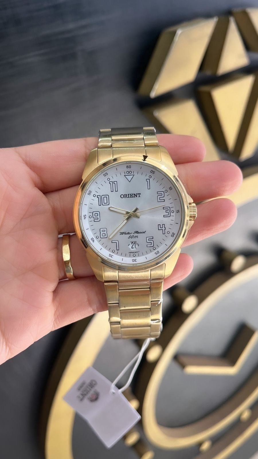 Relógio Orient dourado